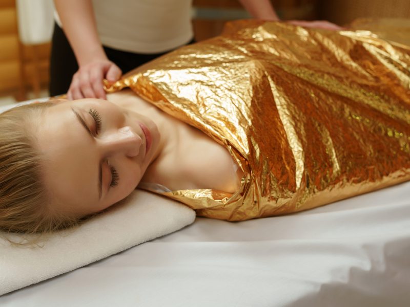 Caring about beauty and health. Body wraps in spa salon